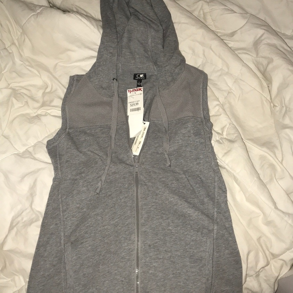 Lightweight vest. Never worn comes w original tags